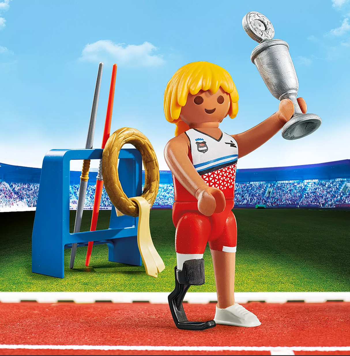 Special Plus | Javelin Thrower Playmobil figure with prosthetic leg holding trophy and victory wreath on stadium track.