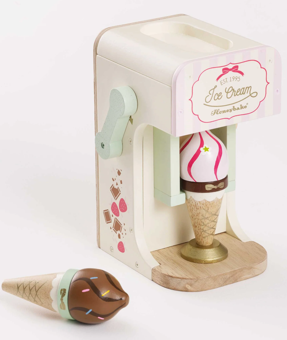 Ice Cream Machine wooden toy with pastel colors, a lever, and magnetic ice cream cones for imaginative play.