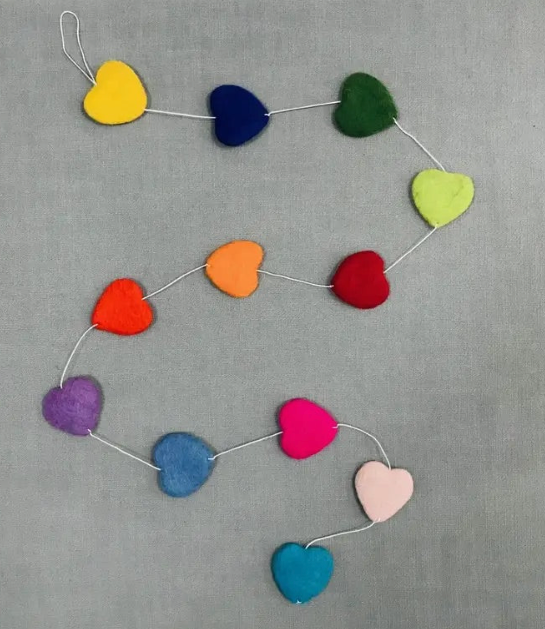 Felt Garland | Hearts with colorful handmade wool felt hearts connected on white string, 57" long, fair trade from Nepal.