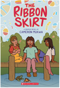 The Ribbon Skirt book cover showing three kids sitting by a lake with turtles and colorful shapes overhead