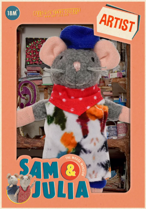 Sam & Julia | Artist plush mouse toy wearing a colorful outfit and blue hat in creative studio setting.