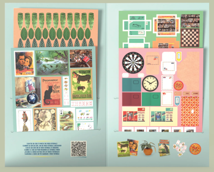 Sam & Julia | Die Cuts: Kid's Bedroom featuring miniature paper boxes, books, plants, and decor for kids' room crafting.
