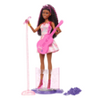 Barbie Pop Star Playset doll with pink guitar, microphone, stage stand, and purple accessories in colorful outfit.