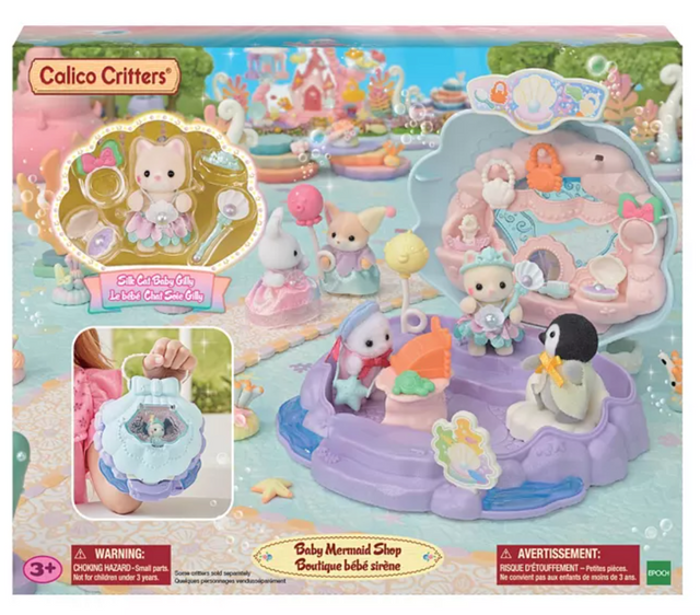 Baby Mermaid Shop with shell-shaped store, ocean accessories, and Silk Cat baby in mermaid costume for ages 3 and up.