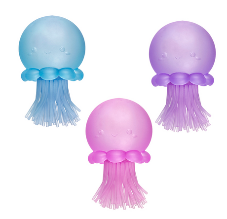 Three colorful jellyfish-shaped Super Duper Sugar Squisher toys in blue, purple, and pink with stretchable tentacles.