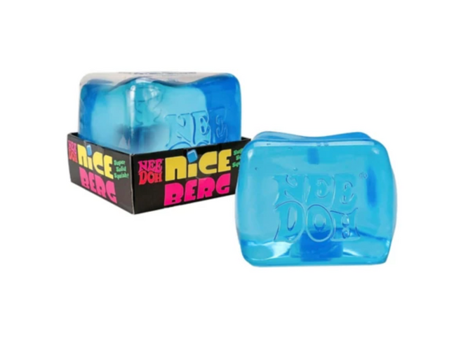 Blue squishy cube fidget toy in packaging, shown outside packaged box, NeeDoh Nice Berg product.