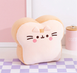 Pusheen White Bread plush showing thick, soft slice with Pusheen’s face, whiskers, rosy cheeks, and tan brown plush.