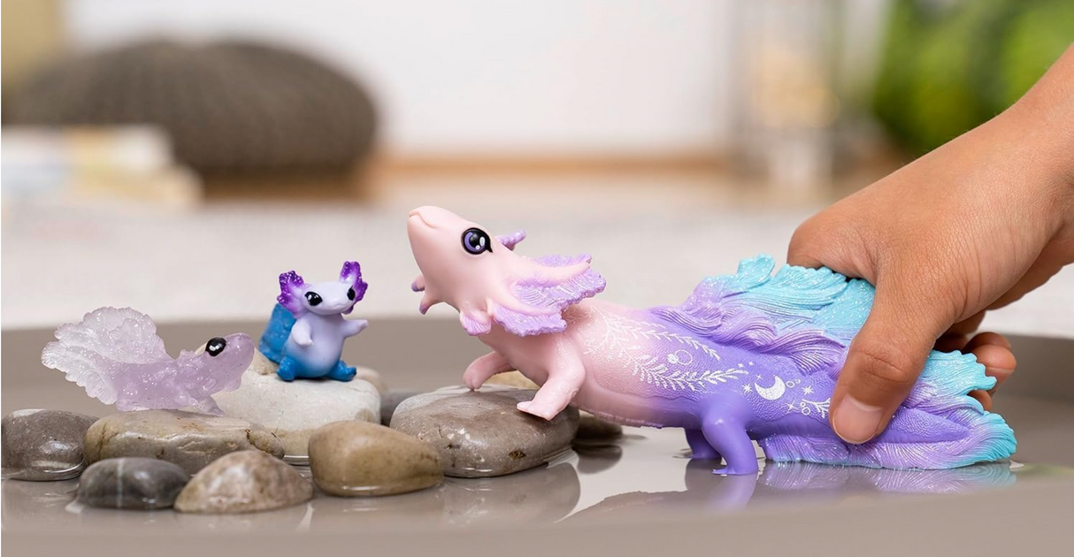 Bayala | Axolotl Discovery Set with three glittering water dragon toy figures, including one large and two small axolotls.