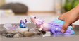 Bayala | Axolotl Discovery Set with three glittering water dragon toy figures, including one large and two small axolotls.
