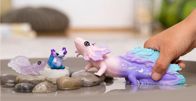 Bayala | Axolotl Discovery Set with three glittering water dragon toy figures, including one large and two small axolotls.