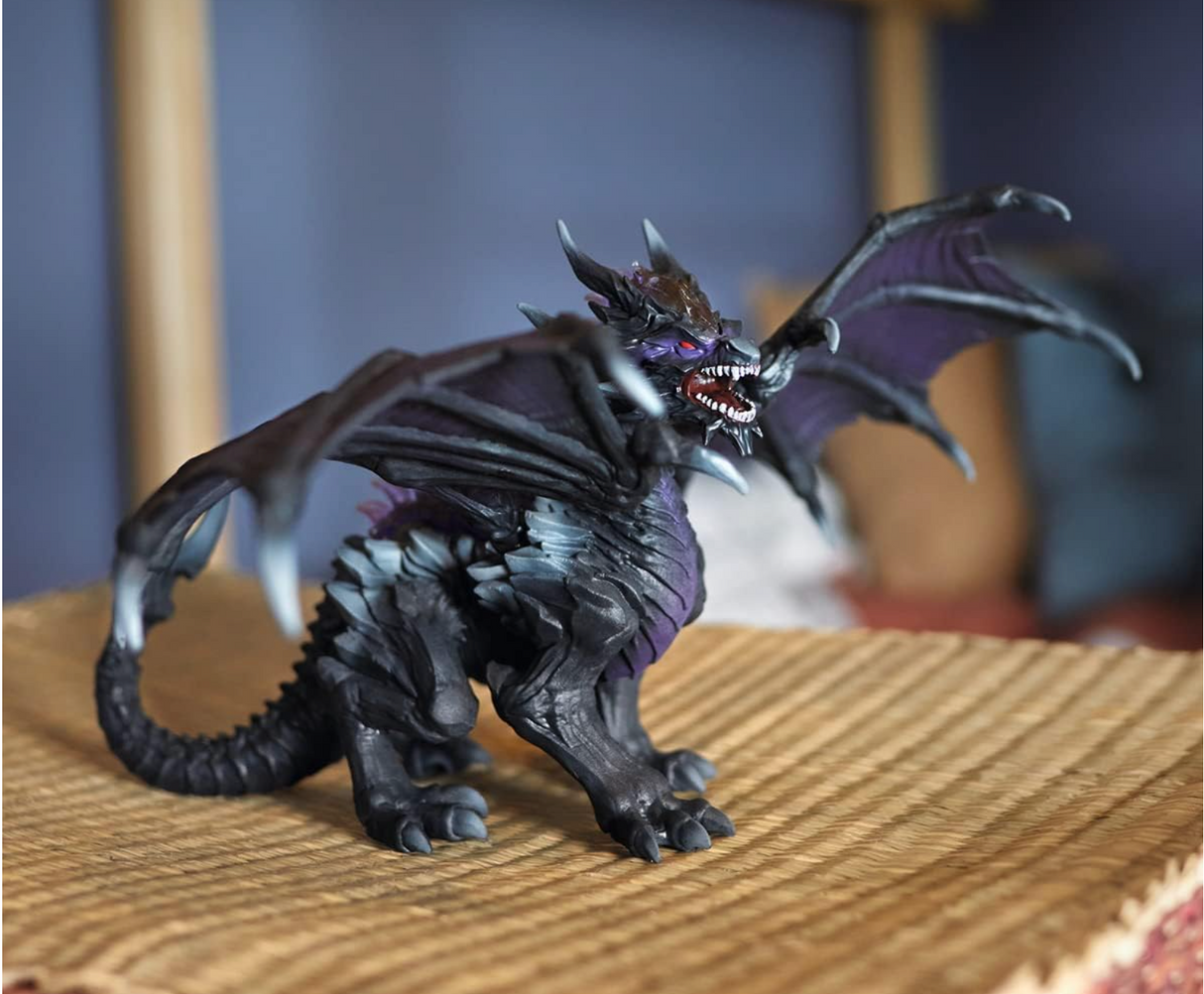 Eldrador Creatures | Shadow Dragon figurine with detailed black wings and fierce expression on textured surface.