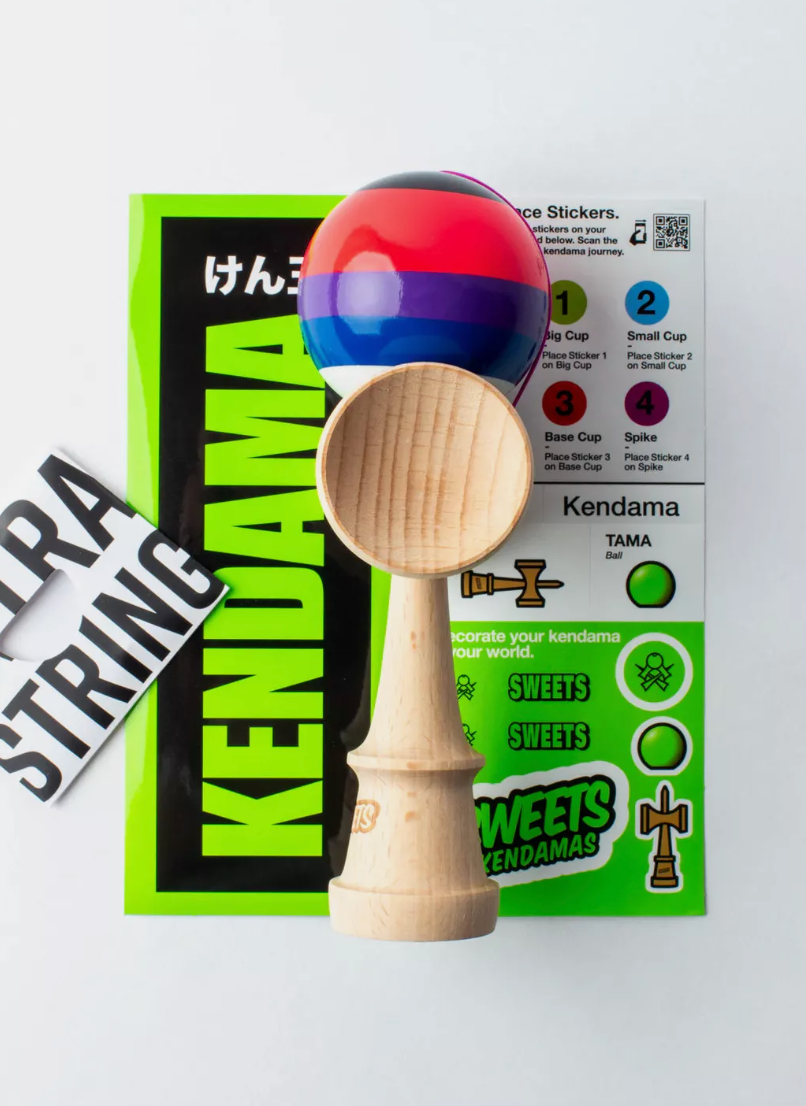 Kendama Prime 5 Stripe Slushy with colorful striped tama, white bottom, and wooden BOOST ken for superior play and style.