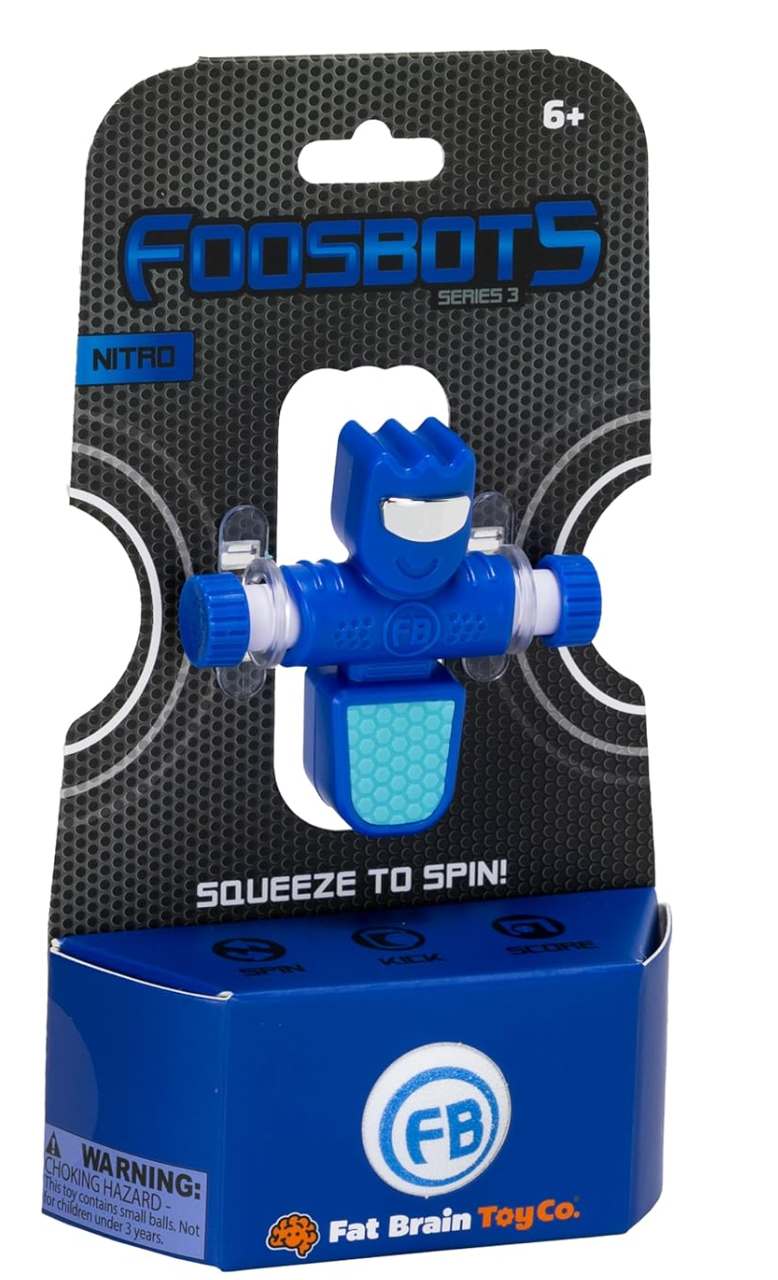 Foosbots Single toy in blue with squeeze-to-spin arms, in branded Fat Brain Toy Co. packaging, for ages 6 and up.