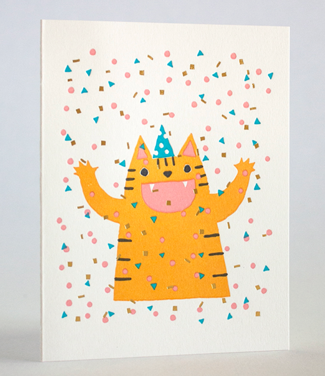 Confetti Cat Card featuring a cheerful orange cat with party hat and colorful confetti, letterpress on recycled paper.