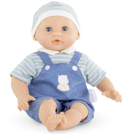 Calin Mael baby doll dressed in blue overalls and striped shirt with a soft vinyl head and blue eyes closed at nap time