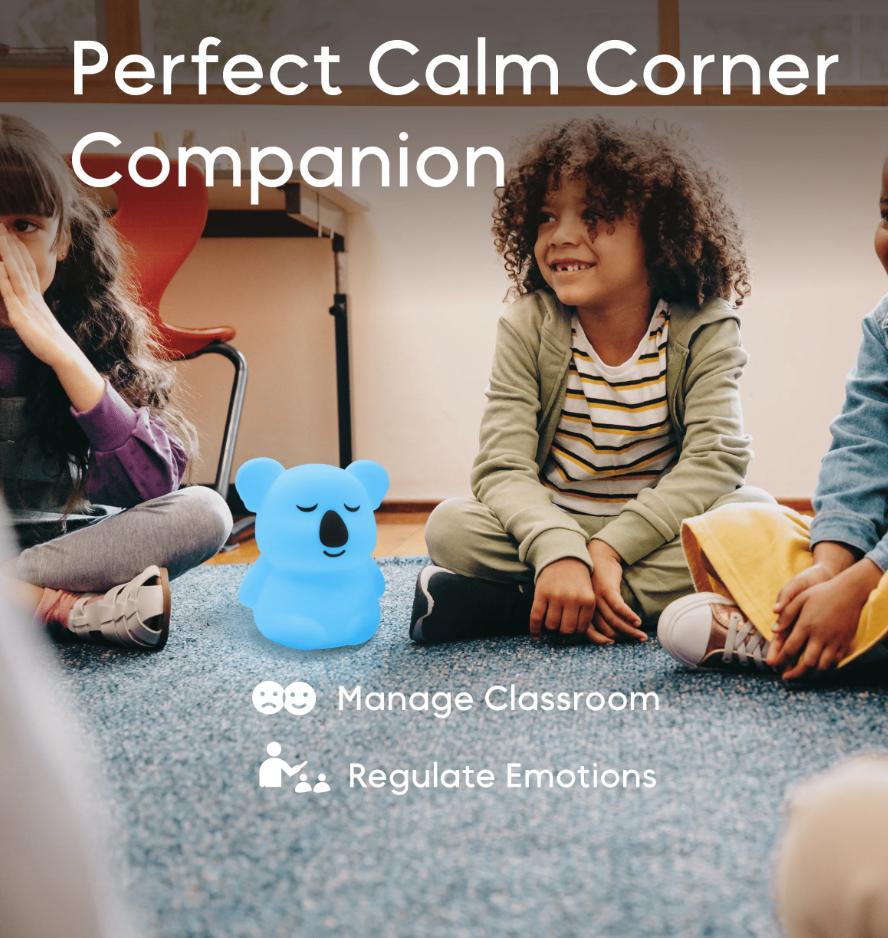 Breathing Pal | Kyle the Koala on classroom floor with children, promoting calm and emotional regulation.
