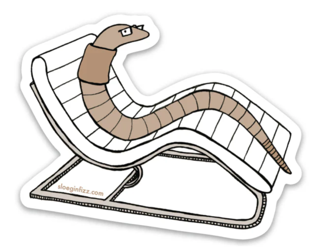 Lounging Earthworm Sticker featuring a mid-century modern design worm relaxing on a sleek chair illustration.