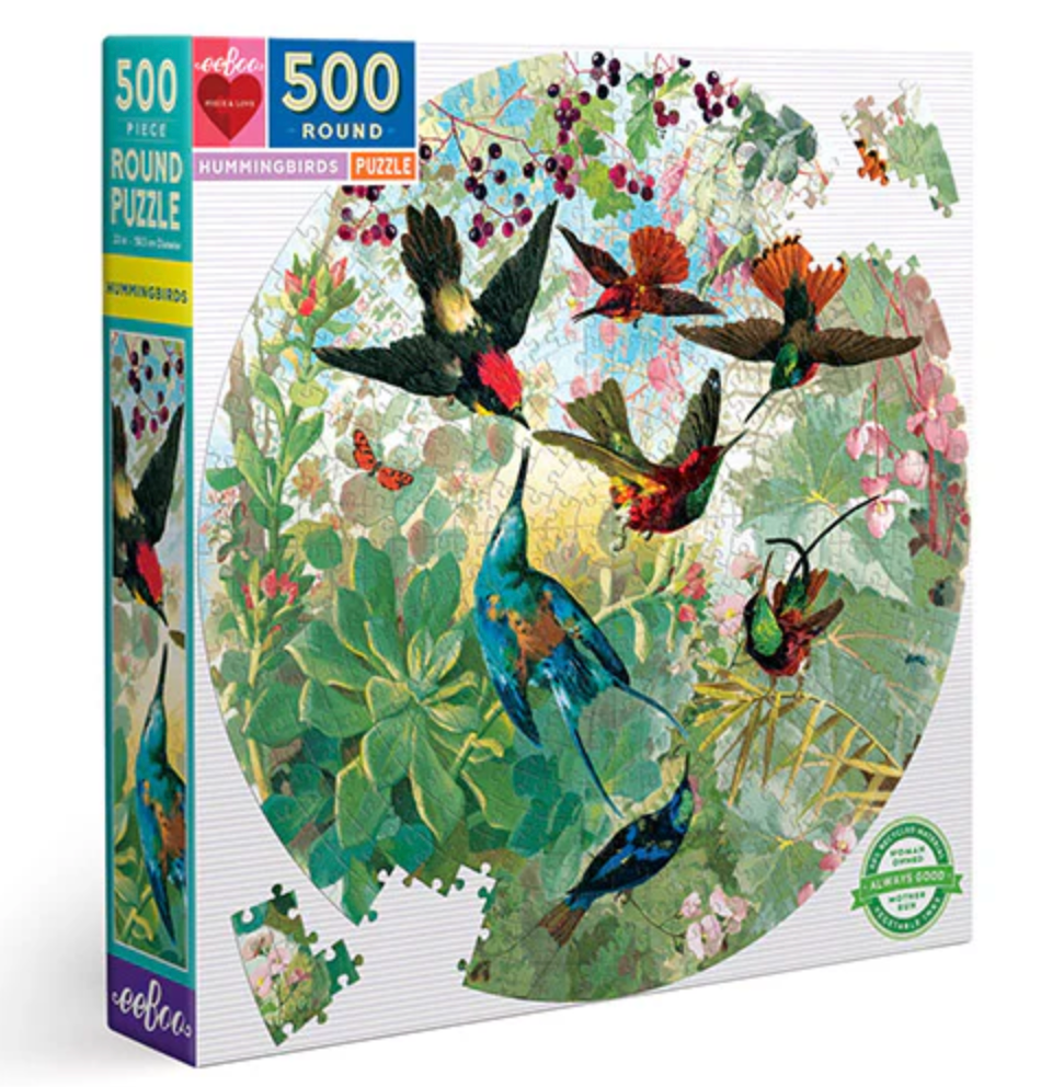 500pc Hummingbirds Round Puzzle featuring vibrant hummingbirds and lush garden foliage in a circular vintage illustration design.