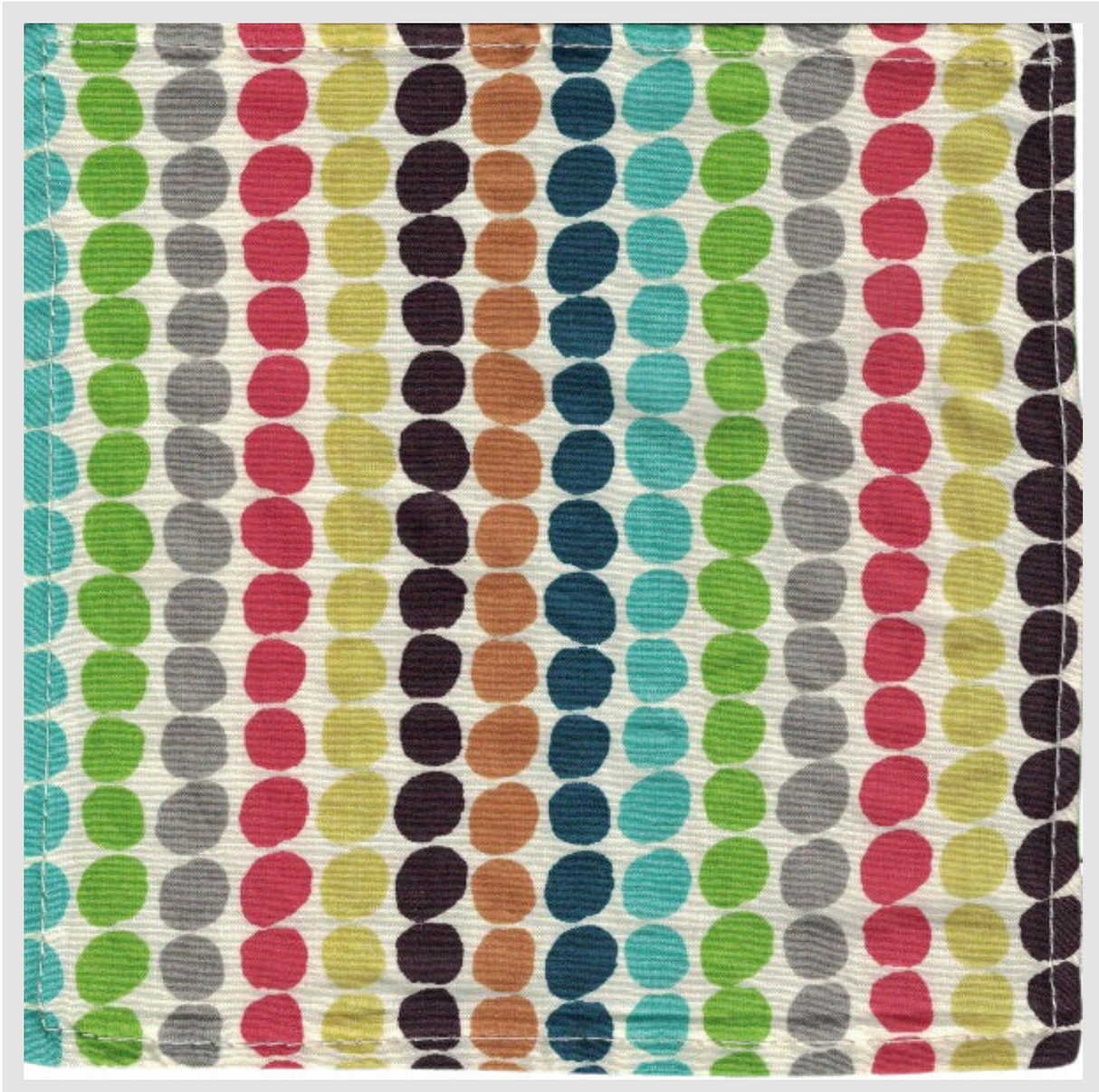 Baby Paper | Organic Pebbles showing colorful organic fabric with pebble pattern, safe for babies to grasp and play.