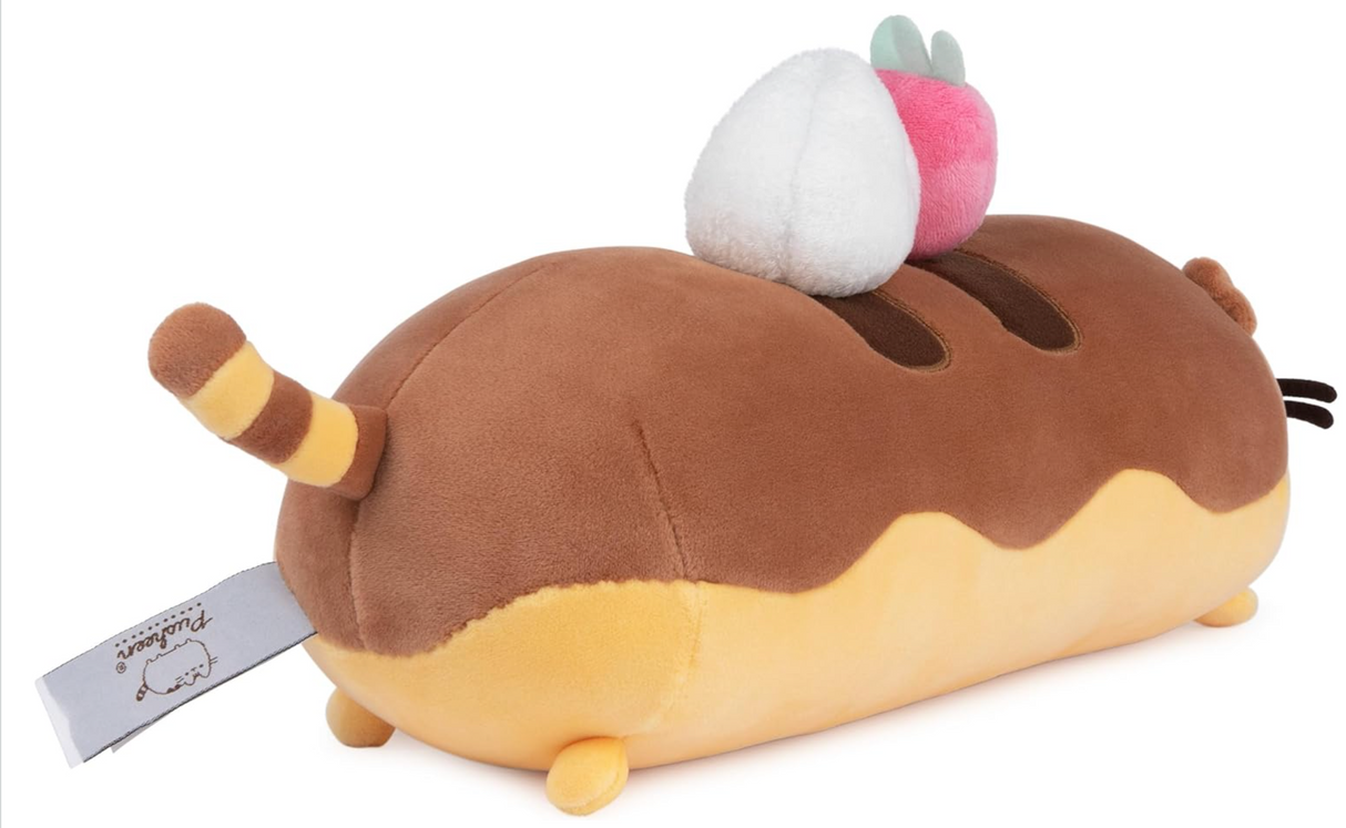 Pusheen Squisheen Eclair plush toy with chocolate éclair design, strawberry, and whipped cream details.
