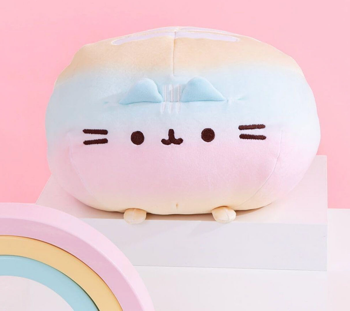 Pusheen Round Squisheen Ombre plush in soft rainbow ombre with round shape, super squishy and perfect for cuddling.