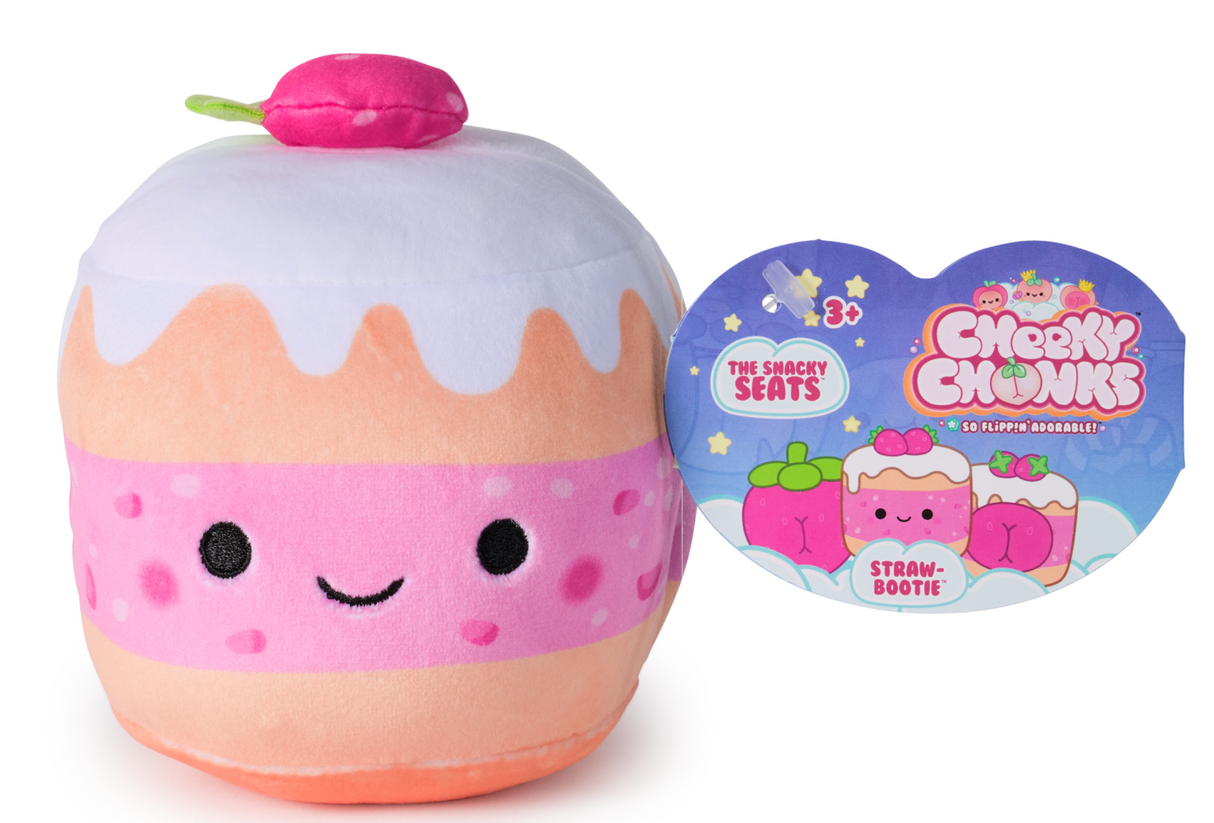 Cheeky Chonks Chonk plush toy in pink and peach with smiling face and cherry on top, soft and squishy 2-in-1 design.