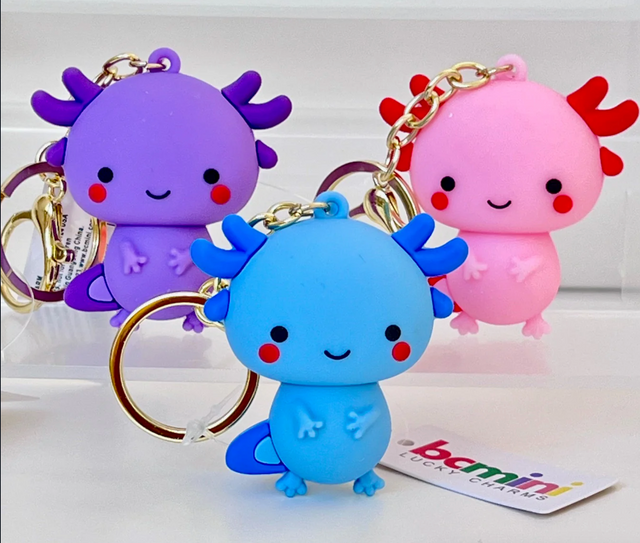 Axolotl Figurine KeyChain in assorted colors with cute smiling faces, perfect for quirky key organization and fun collections.