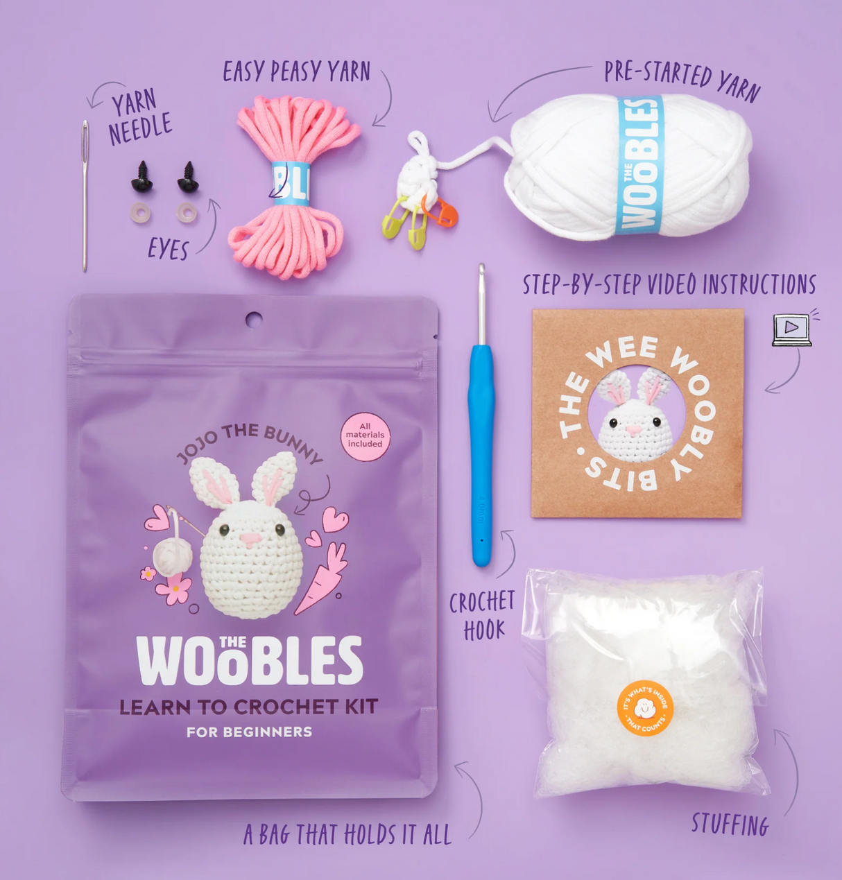 The Woobles Crochet Kit | Jojo the Bunny with yarn, crochet hook, stuffing, eyes, needle, and step-by-step instructions.