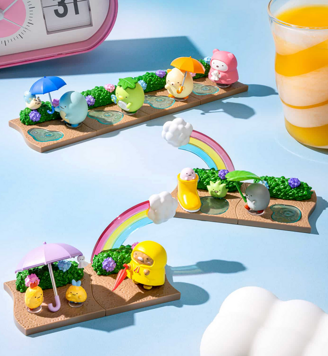 Re-Ment | Sumikkogurashi Walking on a Rainy Day Blind Box featuring connected rainy day character figurines.