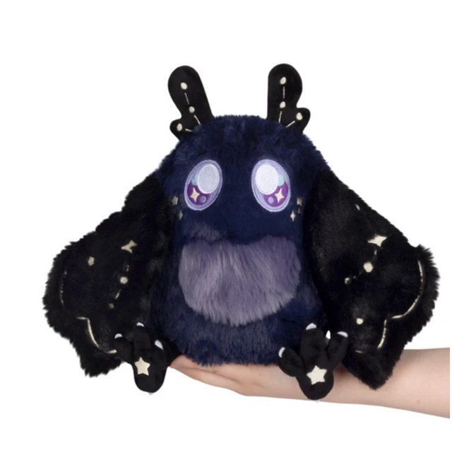 Midnight Mothman Mini plush with magnetic wings and starry patterns, held on a hand, soft and perfect for ages 3 and up.