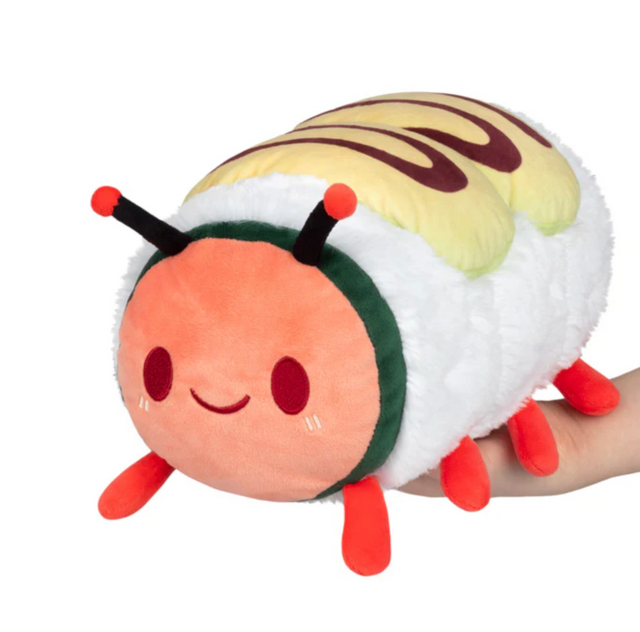 Caterpillar Roll Mini plush toy with a cute smiling face and colorful soft body held in hand.