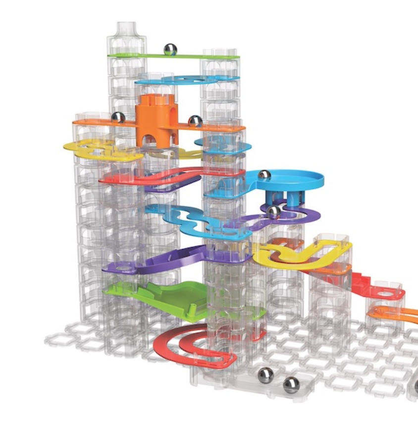 Trestle Tracks Builder Set with colorful stacking cubes and tracks guiding stainless steel marbles through a marble-track adventure.