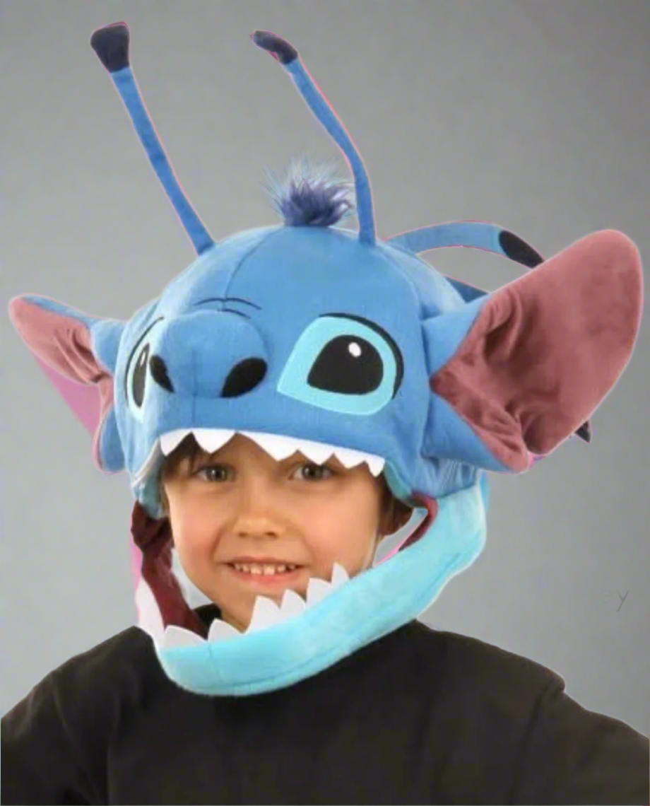 Child wearing the plush Disney Stitch Jawesome Hat with large ears, antennae, and inner size adjuster.