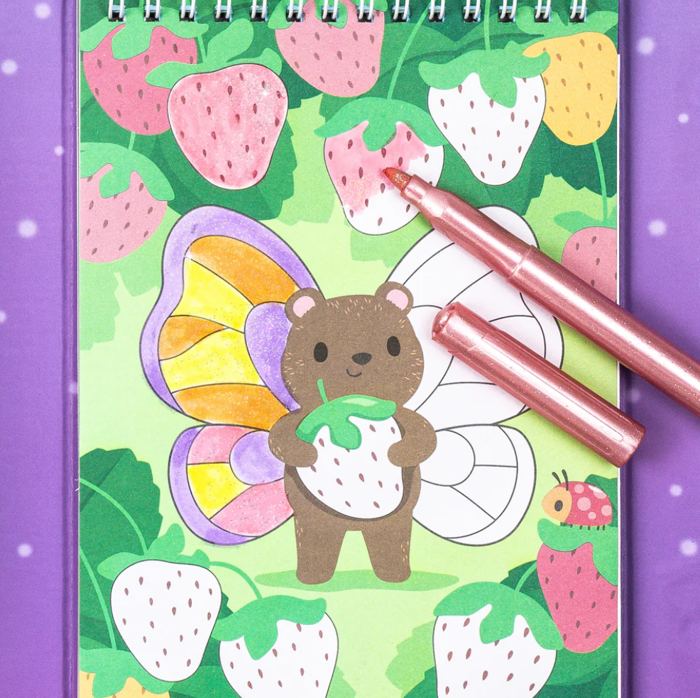 Coloring Set | Little Fairy Land showing a fairy-winged hamster coloring page with shimmer markers on a purple background.