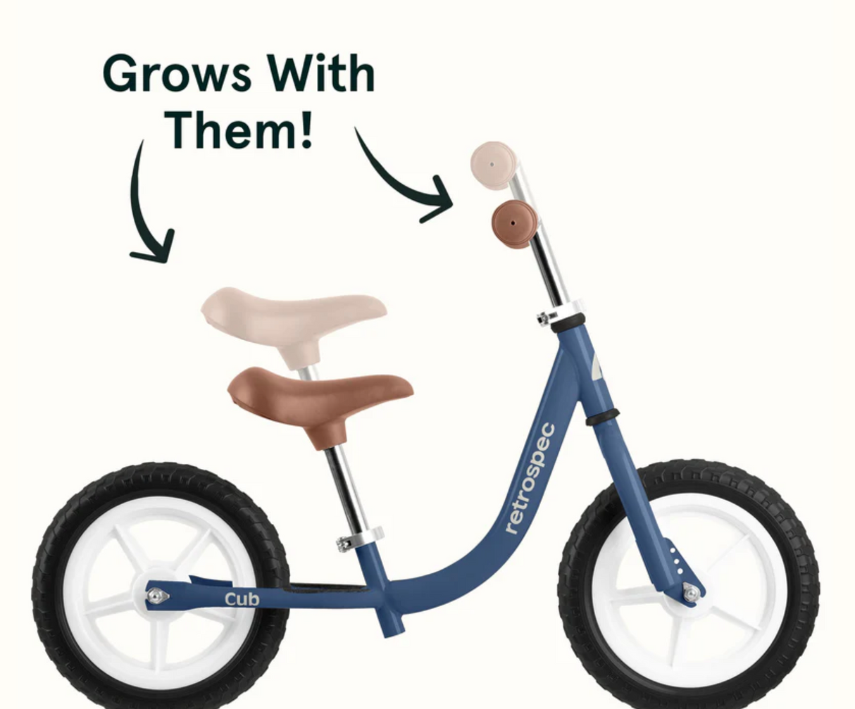 Cub Balance Bike | Navy with adjustable seat and handlebars for growing toddlers, lightweight frame, and airless tires.