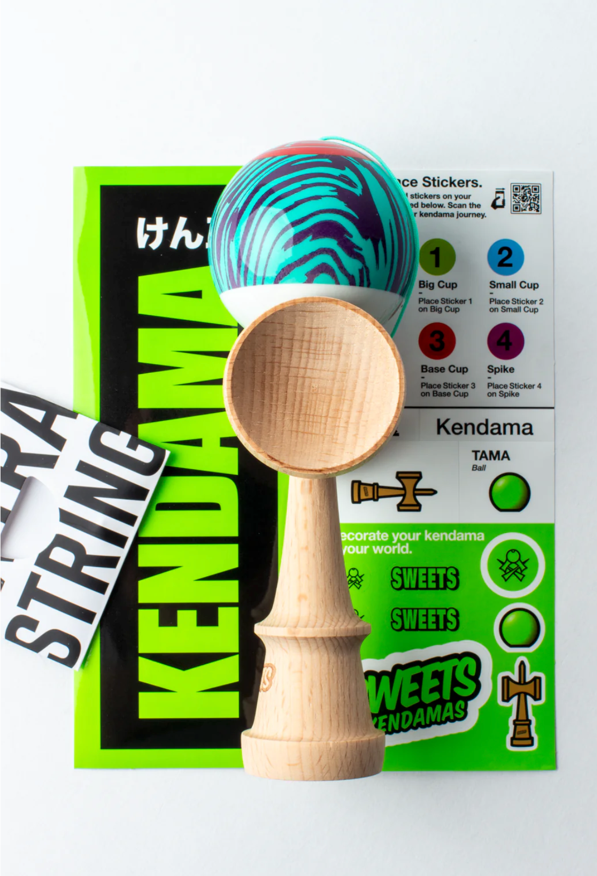 Kendama Prime Grain Split | Laser Tag with blue wood grain tama, natural wooden handle, and colorful accessories pack.