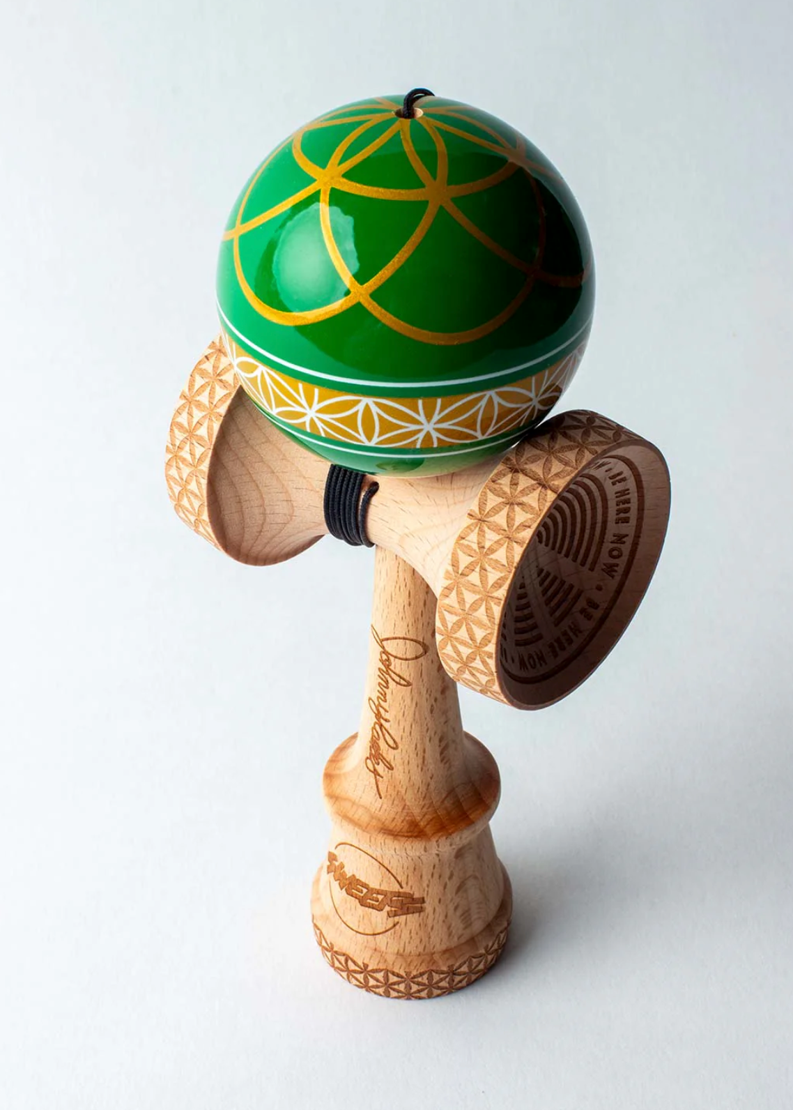 Kendama Johnny Raekes V2 BS Sticky with green tama and intricate wooden design for advanced kendama tricks.