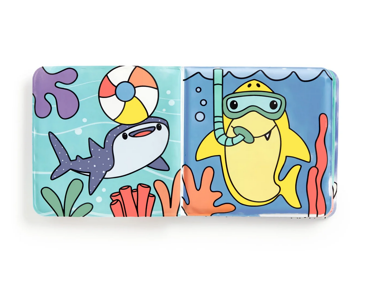 Bath Book Color Magic | Shark Splash! shows colorful sharks underwater with coral and a beach ball on waterproof pages.