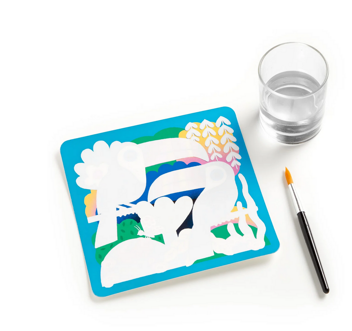 Color Magic Water Reveal Rainforest Friends showing white animal outlines ready to be painted with water and brush beside a glass of water.
