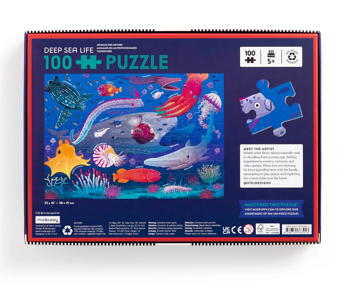 100pc Deep Sea Puzzle showing colorful underwater creatures on a completed 100-piece puzzle for kids ages 5 and up