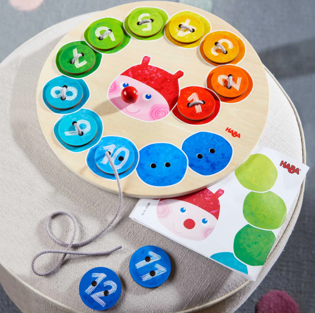 Rainbow Caterpillar Counting Threading Game with colorful numbered tiles and threading cord for fine motor skill development