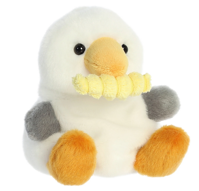Palm Pals Seagull with Fry Buoy plush toy with soft feathers, orange feet, and a yellow beak holding a crochet crinkle fry.