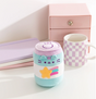 Pusheen Gamer Pop Sip plush featuring a blue and white striped drink can with purple details and a yellow shooting star design.