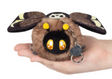 Soft plush toy of Death's Head Hawkmoth Micro with keychain, held in a hand showing its small size.