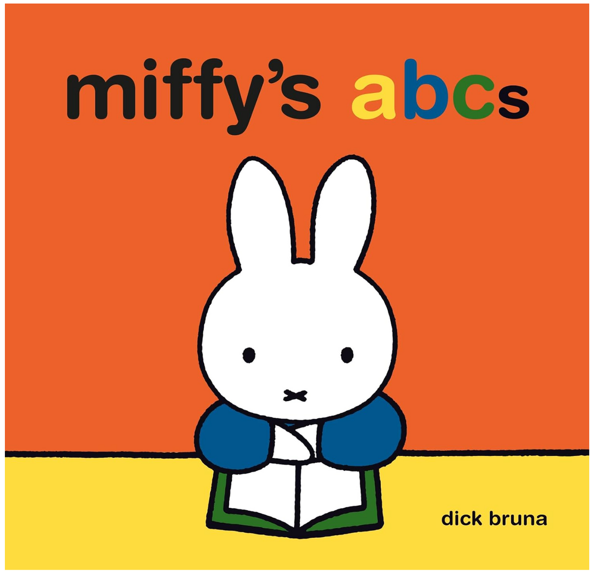 Cover of Miffy's ABC's hardcover board book featuring Miffy the bunny holding a book on an orange and yellow background.