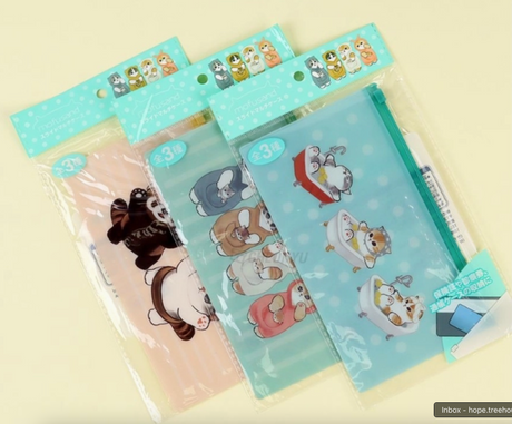 Set of three translucent Mofusand pencil pouches with cute animal illustrations on pastel backgrounds.