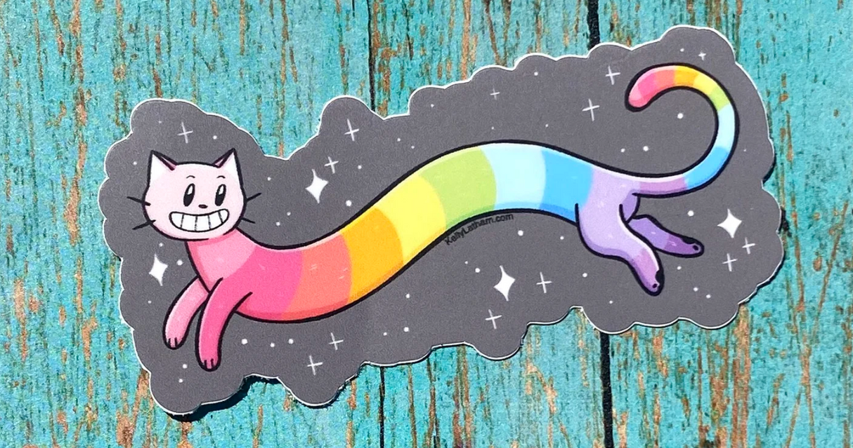 Colorful vinyl sticker of a long cat with rainbow stripes and a smiling face on a dark sparkling background