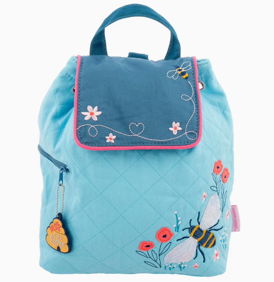 Quilted backpack in blue with embroidered bees and flowers, perfect for preschool and everyday use with magnetic snap closure