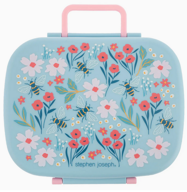 Light blue bento box with pink handle featuring floral and bee design for kids with removable tray and airtight lid.