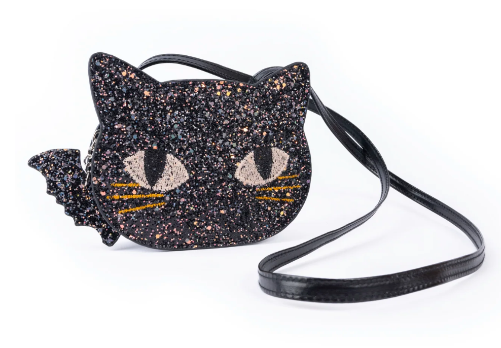 Black glitter cat-shaped purse with embroidered eyes, whiskers, bat-wing detail, and adjustable strap for crossbody wear.